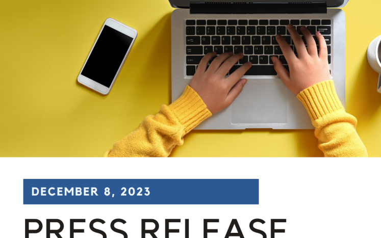 hands typing on a computer with the words "Press Release"