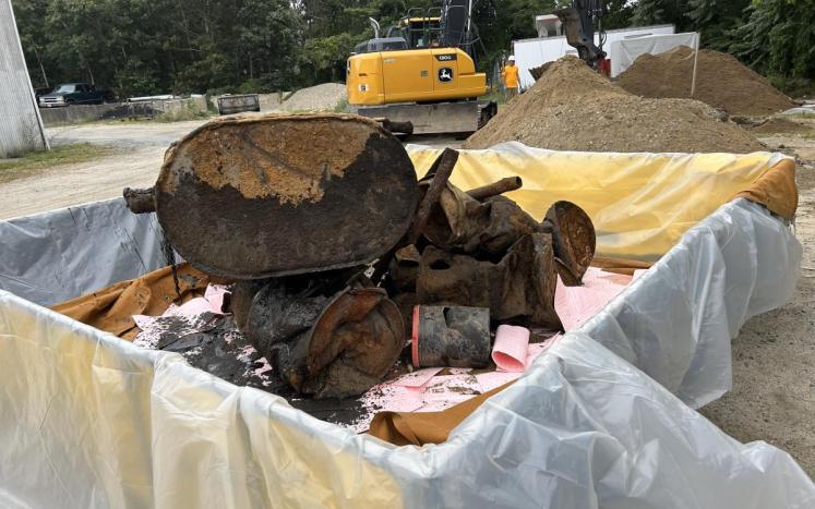 A photograph of barrels excavated during Phase 2 Environmental Assessment